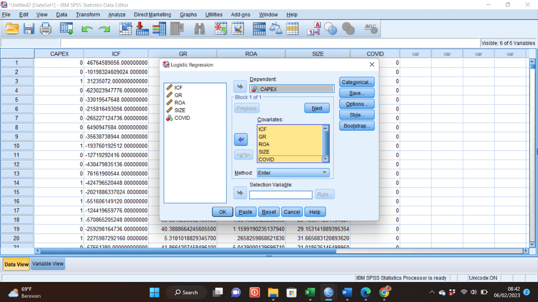 Input variabel dependent dan covariates pada dialog Binary Logistic